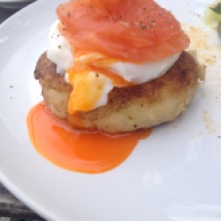 poached egg yolk runny potato cake brunch breakfast salmon